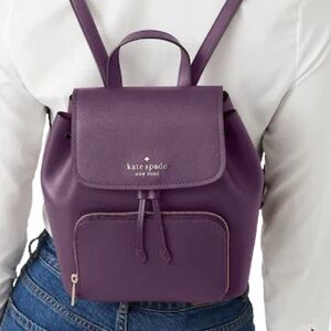 Kate Spade Darcy backpack purse in plum purple.